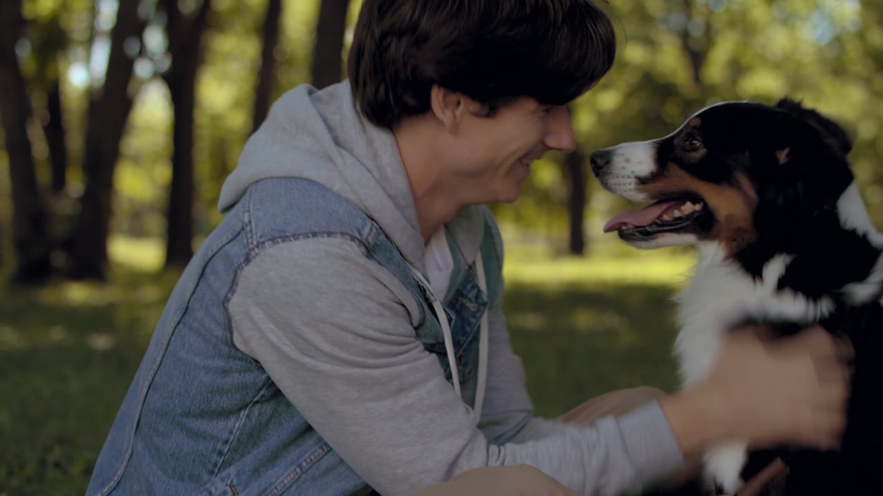 A woman greeting her dog in the Greater Texas Credit Union Best Friend commercial