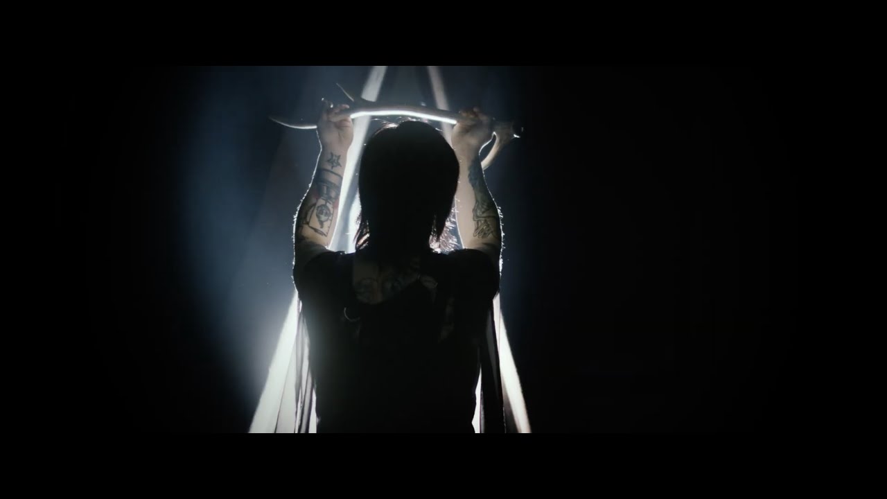 A backlit performer in the Saturday Nite Shockers music video Blessed Be